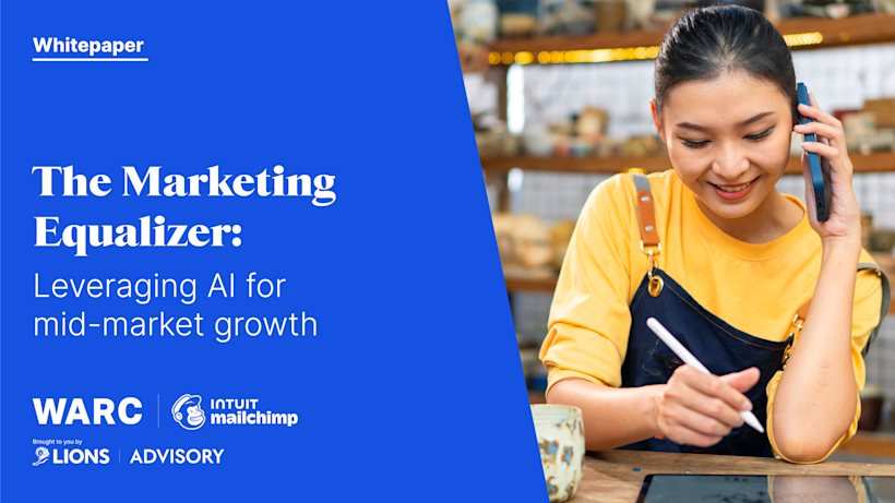 Business owner in yellow sweater taking notes while on phone, next to whitepaper title about AI marketing on blue background